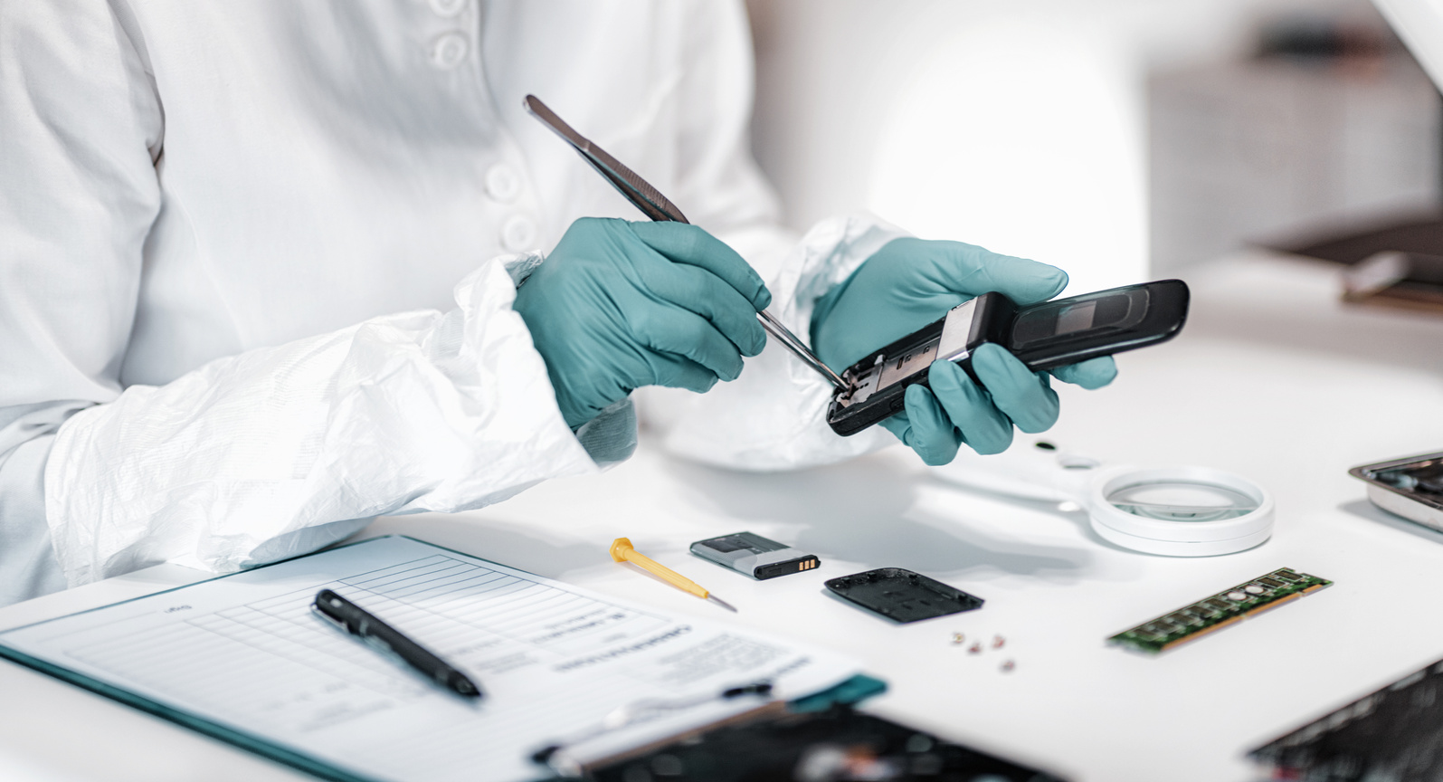 Forensics. Police Expert Examining Confiscated Mobile phone